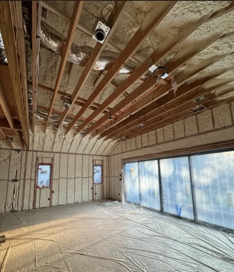 Interior walls and ceiling insulated with spray foam during new construction in Ivins